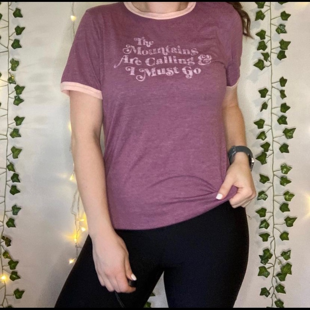 North Face “The Mountains Are Calling” Purple T Shirt
